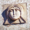 Женская маска на фасаде. XII в.
